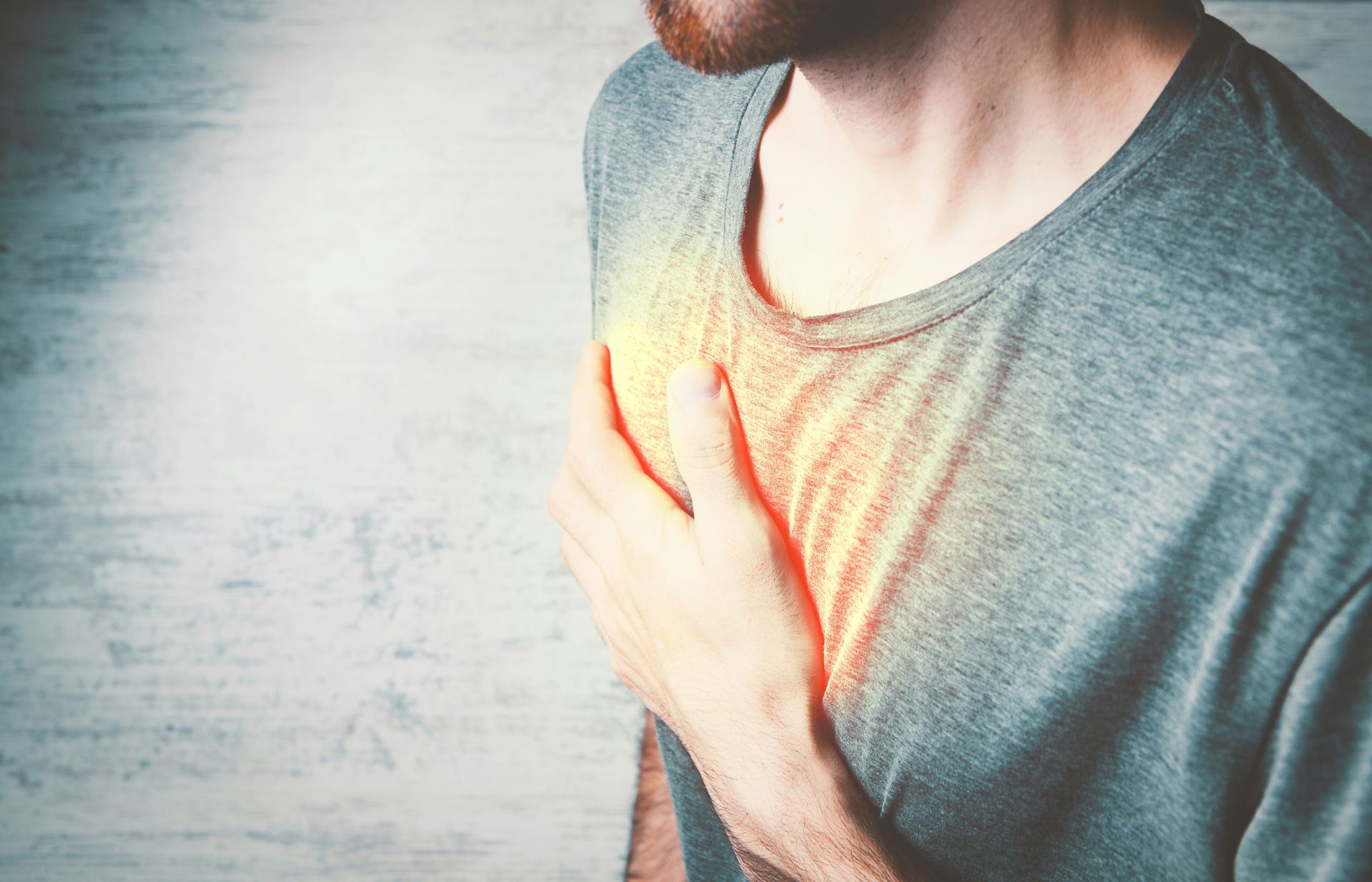 hand over chest illuminated hand