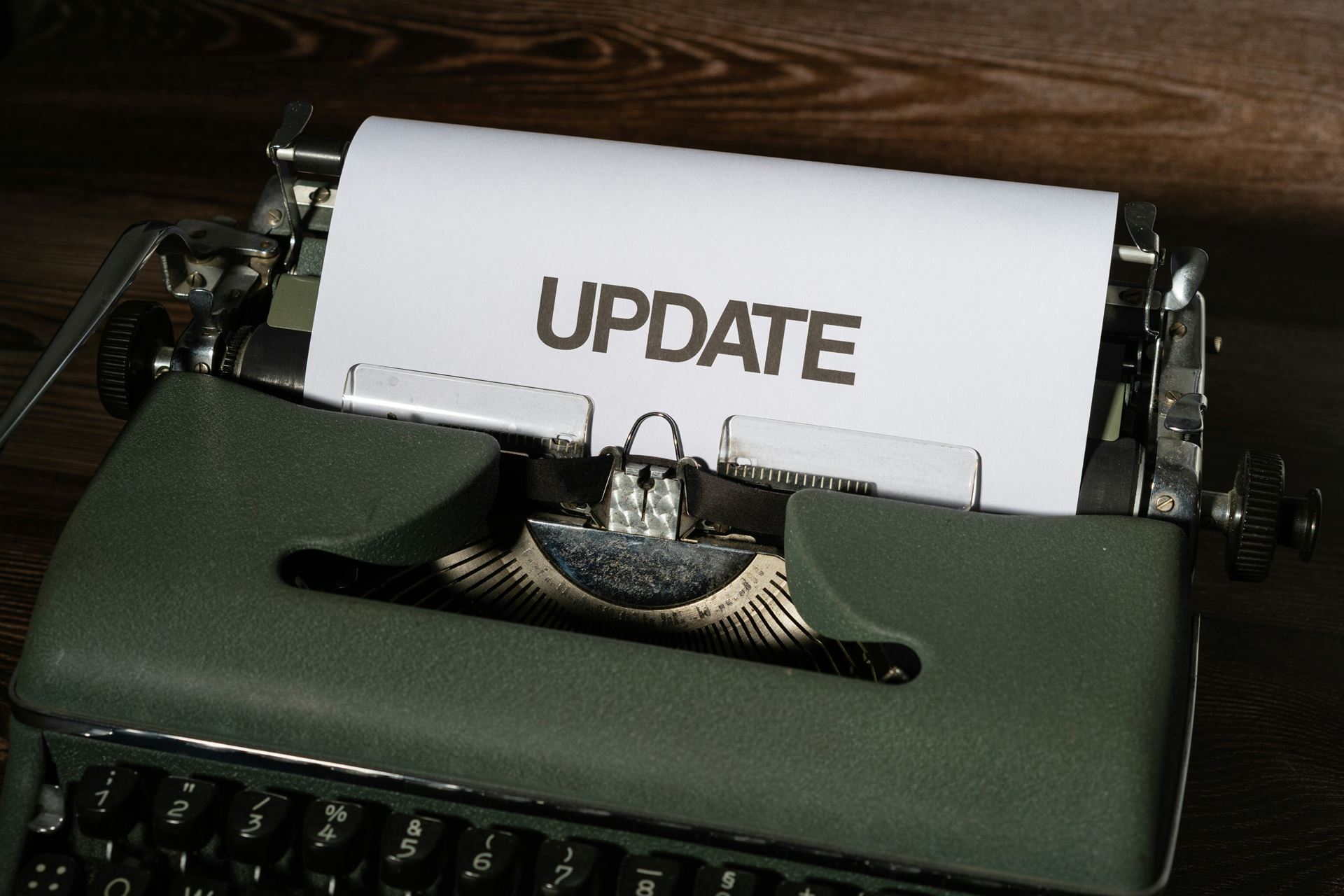 typewriter with the word update on it